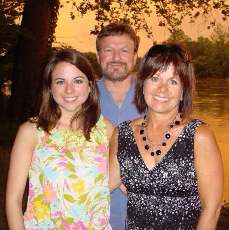Claire (left) with mom and dad, Greg and Laurie