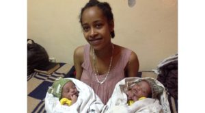 Out of the ICU with her beautiful babies.